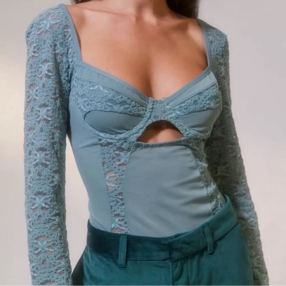 Out from under dark romantic lace bodysuit